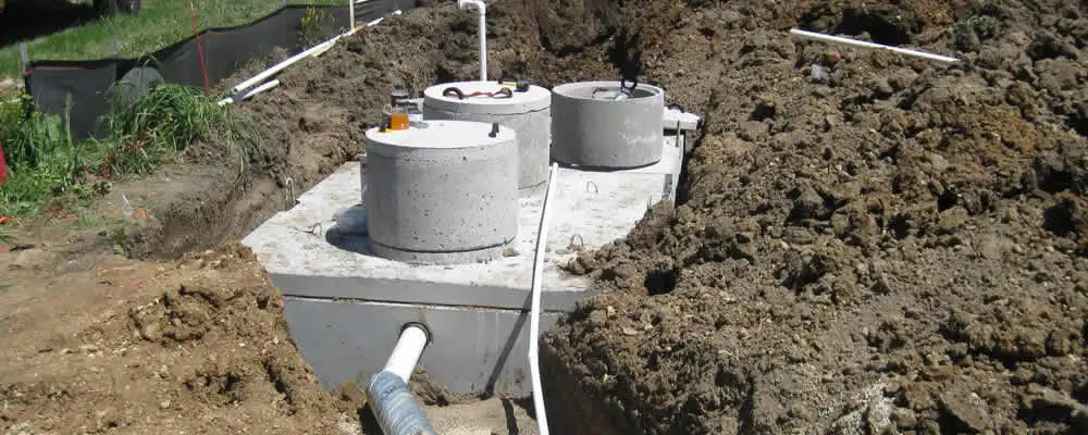 Septic system repair and installation site with tank access ports in Stockton, CA